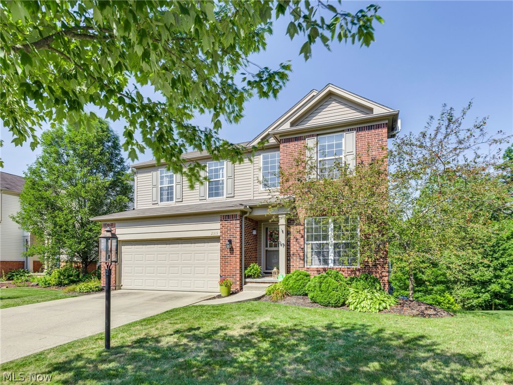 This beautiful and Fully updated home is ideally situated on one of the most private lots in the development as it overlooks acres of undeveloped land. Inside you'll find an attractive open floor plan with an updated kitchen featuring Tile back splash, Center island w/ granite counter top and White soft close cabinetry. Kitchen provides access to the large two level deck and is open to the family room making it ideal for entertaining. Family room features gas fireplace and New carpet! Main level is completed with a formal dining room or den option, a first floor laundry room and updated half bath. Upstairs boasts 4 large bedrooms and 2 full bathrooms. The vaulted master suite is beautiful with a recently renovated masted bathroom and 13 foot walk-in closet! The finished lower level adds approx. 500 Sq ft of living space to this home and walks out to a nice patio with great views. The basement has been pre-plumbed for a future bath. This level can be your private retreat or an entertain