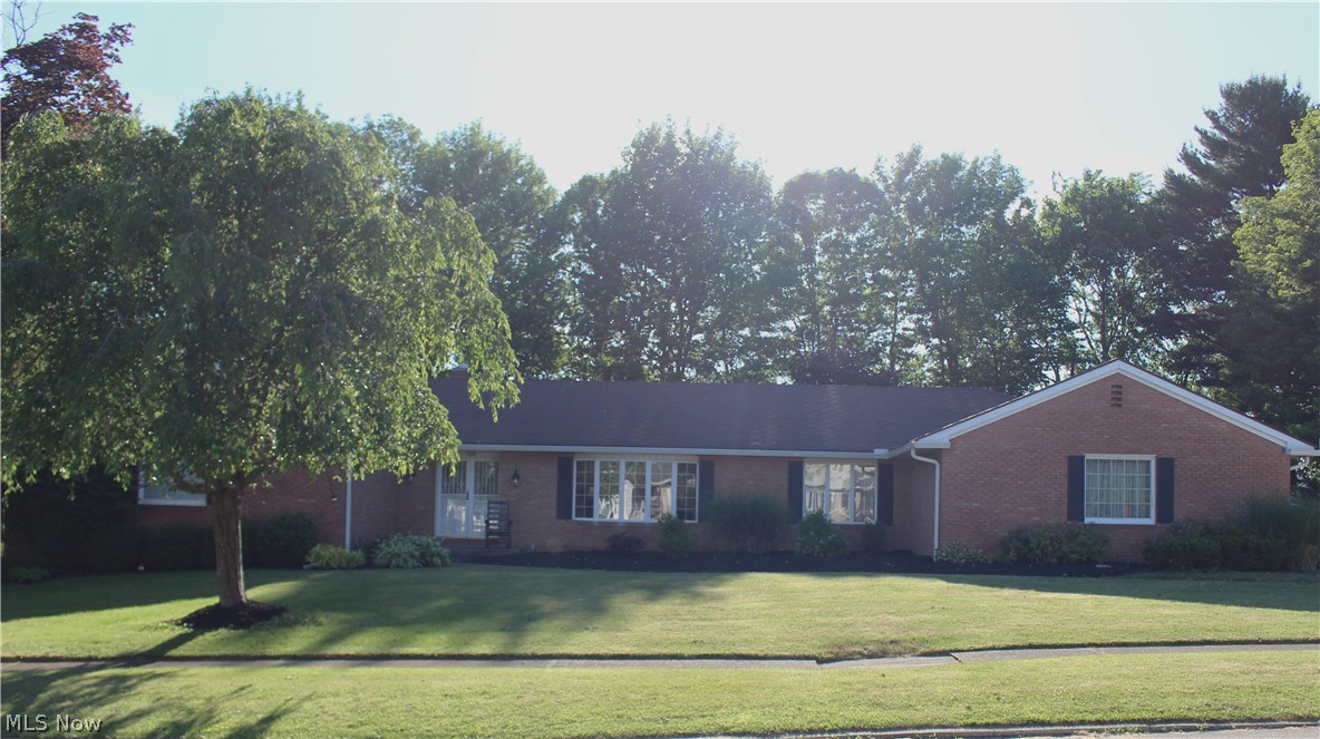 Sprawling 5 bedroom, 2.5 bath, well maintained brick home in the Lexington school district and Royal Oak Neighborhood.  The fantastic floor plan features over 2700 square feet of living space and sits on a beautiful, nearly half acre lot with private backyard feel.  Watch the sunset over the field from your western facing, shaded patio.  The family room features a gas log fireplace insert and French doors that open to the back sunroom surrounded by 3 walls of glass.  The enormous, newly updated eat-in kitchen features new stainless-steel appliances, quartz countertops, a subway tile backsplash that were all new in 2023.  The kitchen has all the counterspace you could ask for and an attached Butler's pantry! The conveniently located mud room/laundry is located between the kitchen and 2.5 car garage.  The primary suite has 3 closets, 2 vanities and a shower.  Home is wired for a portable generator that is included.  Air conditioning, Furnace & Gas Hot Water Tank are new in 2023.  Shed in back is 16 X24.