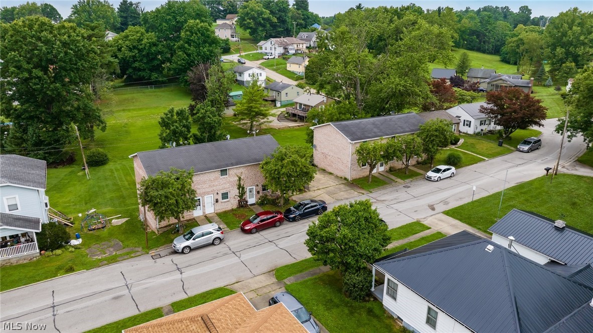 Six unit investment opportunity in Cambridge! Good luck finding more of these unicorns. These two brick buildings are fully occupied and gross over $55,000 annually. Each townhouse unit has two bedrooms, a single bath, and have natural gas heat & central air. Tenants pay all utilities, Owner pays grounds care and trash. Ready to sell. Call today for a showing, these won't last!