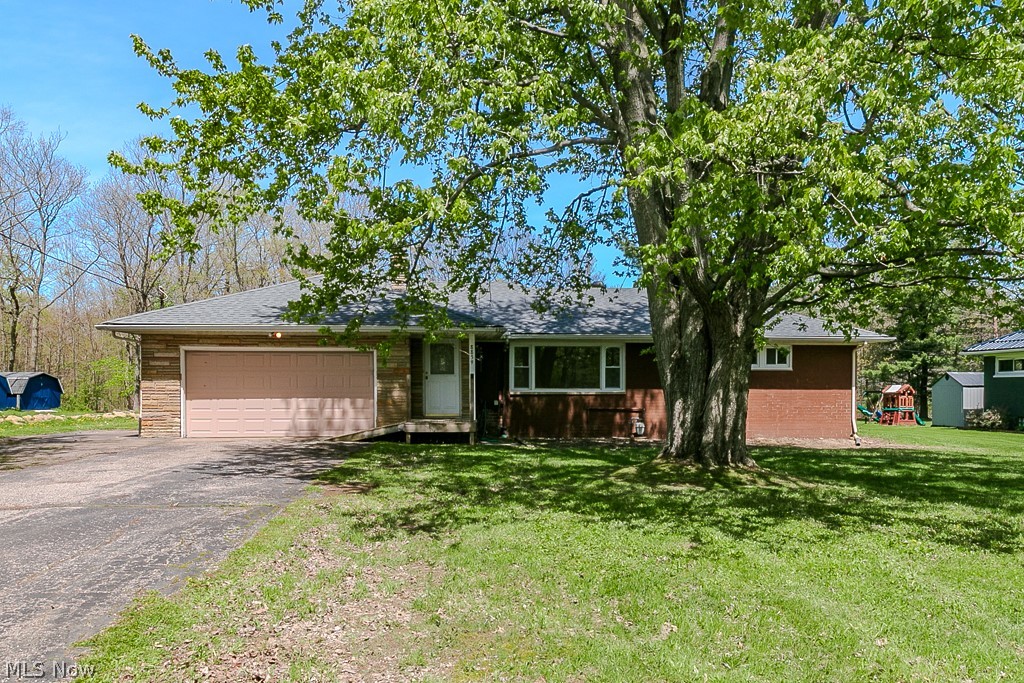 Welcome to 8839 Billings Rd in Kirtland, a beautifully updated 3-bedroom, 2 full bath home situated on a spacious 1-acre lot! This move-in ready property has been completely renovated with modern finishes throughout, featuring a stunning new kitchen with stylish cabinetry, updated countertops, and brand new appliances. Both full bathrooms have been tastefully updated, with one showcasing high-end, beautifully crafted tile work and premium finishes that truly stand out. Enjoy peace of mind with a brand new roof, along with updated flooring, paint, and thoughtful touches throughout the bright and inviting interior. The home also features a huge, clean, wide-open basement, a blank slate ready to be finished for additional living space, recreation, or storage. With plenty of outdoor space to enjoy and a desirable location, this turnkey home offers both comfort and convenience. Don’t miss your chance to make it yours!