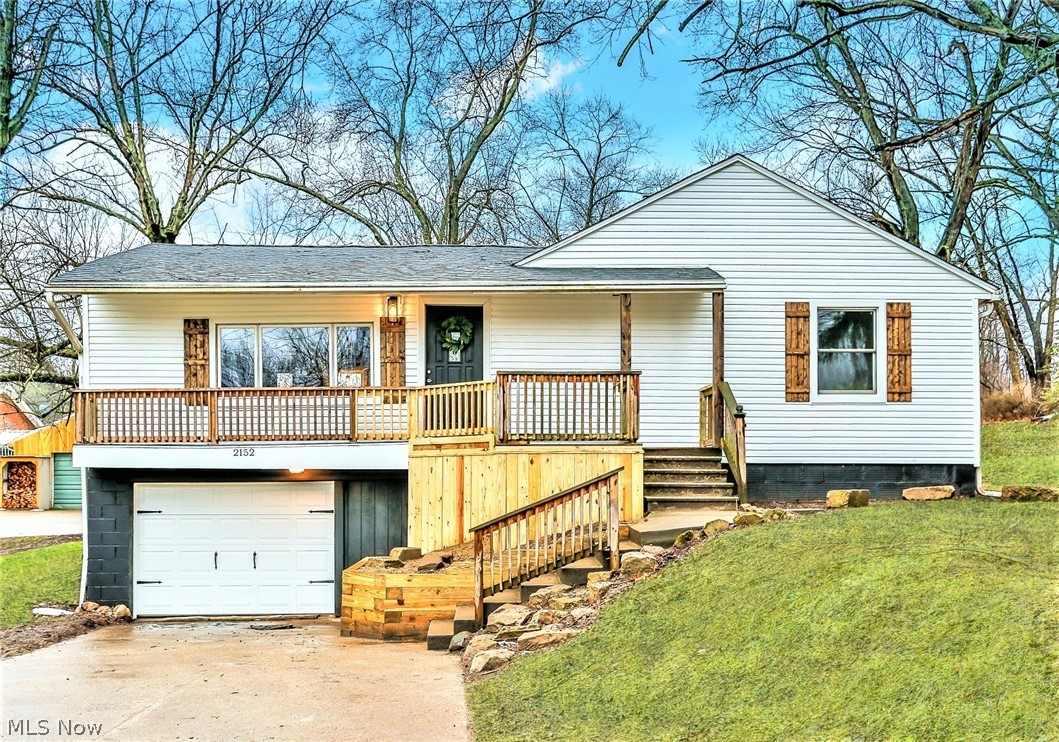 ** Stunning One Floor Masterpiece ~ This FULLY Remodeled Ranch Is A Showstopper! *1300+ Sq. Ft W/3 Bdrms, 2 FULL Bathrms, Attached 1.5 Car Garage & 1.2 Acres Of Land! *Impress Your Guests From The Moment They Walk In With A New Open Floor Plan Layout! *Updates Include: Brand NEW Architectural ROOF, VINYL SIDING & Almost All NEW WINDOWS! *LUXURY Plank Flooring And Reclaimed Shaw Carpet Throughout! *Walk In To A Fully SHIPLAPPED Living Rm, Dining AND Kitchen! *Eat In Kitchen W/Custom Brown Rustic Wood Accent Ceiling, New Fresh White Shaker Arcadia Style CABINETS, Butcher Block COUNTERTOPS And Custom Large Center ISLAND! Stainless Steel Appliances Including A Gas 5 Burner Stove With Middle Griddle, Commercial Style Faucet W/Sprayer And  Overmount Sink! *Brushed Nickel Valleymade Jar Pendant Lighting Fixture And Triple Flushmount *Gray Rustic Plank Flooring *Dining W/Sliders To The Back Yard *1st Floor Laundry Added For Convenience! *Master Bdrm W/New Ensuite Master Bathroom! *Master Bathr