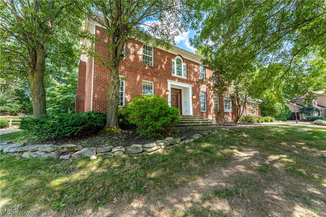 This stately and prestigious 5 Bedroom, 4 Full Bath and (2) 1/2 Bath home with 3 car garage, can be found within the coveted and established neighborhood of Foxchase Hills in Jackson Township. The all brick exterior, beautiful front steps, brick walkway, and mature trees immediately show off this home’s timeless elegance. Inside, you will find an entry with 17’ ceilings and curved staircase leading to the upper level. With over 6,000+ square feet of living space, the floor plan seems endless. To the left of the entry is a formal living room which could also be used as an office. To the right you’ll find a large formal dining room with an adjoining butler’s pantry with wet bar. The expansive kitchen with ageless design features a large island, solid surface counters, a double oven, gas stove, and more storage than anyone could wish for. Off the kitchen you will find a four seasons sunroom with vaulted ceilings and access to the private back patio and yard which morning coffees are made for. An elegant den with custom built-ins, wet bar, and coffered ceilings add to this homes grandeur. Two half baths, a mud room and a first floor laundry finish off this home’s main level. Dual staircases lead to the upper level with a split floor plan. The primary suite is the perfect escape after a long day, with an ensuite bath complete with soaking tub, double walk-in shower and elongated double vanity.  Just down the hall are three more bedrooms with two full baths, allowing the kids to have their own space. The lower level is just as impressive with a home theater area, large family room and custom walk-in wine cellar, perfect for all your entertaining needs. An additional guest bedroom and full bath finish off the lower level. Schedule a private showing today to see this in person.