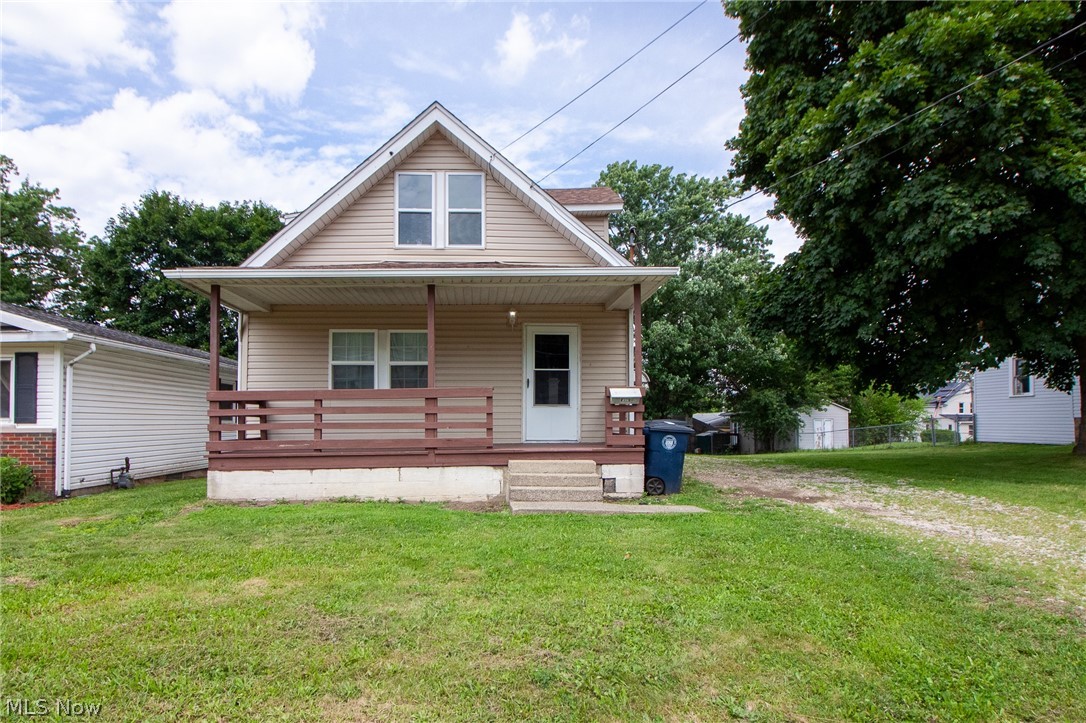 Welcome home to this charming 3-bedroom, 1-bath Cape Cod nestled on a spacious lot in Akron. Full of character and potential, this home offers a comfortable layout with bright living spaces, an inviting living room, and a functional kitchen ready for your personal touch. One bedroom on the main floor provides convenient one-floor living, while the upper-level bedrooms offers additional privacy and flexibility for a home office, guest room, or primary retreat.