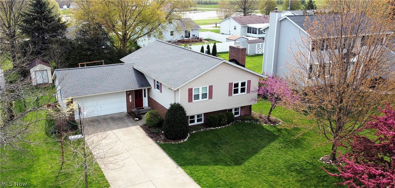 Welcome to this charming three bedroom, two and half bath split level home. Come on into the large inviting foyer up to the open floor plan offering the living room, dining room, and kitchen. The dining room offers a slider door which allows natural light to shine through and leads out to the large deck to enjoy or for entertaining. The open, bright and classy remodeled kitchen (2019) has an abundance of cabinets, counterspace, new dishwasher, new oven, new microwave. There are three bedrooms on the main level and a fully remodeled bathroom (2020-2021).  The master suite has a fully remodeled bathroom (2020-2021). In the lower level you will find a comfortable and warm feeling finished family room with gas fireplace, half bath, finished office area (2019), just so much room for entertaining, enjoying movie night etc., plenty of storage and laundry area. The beautiful large fenced in backyard has a patio space, deck, storage shed for all those outside tools. There is a two car attached
