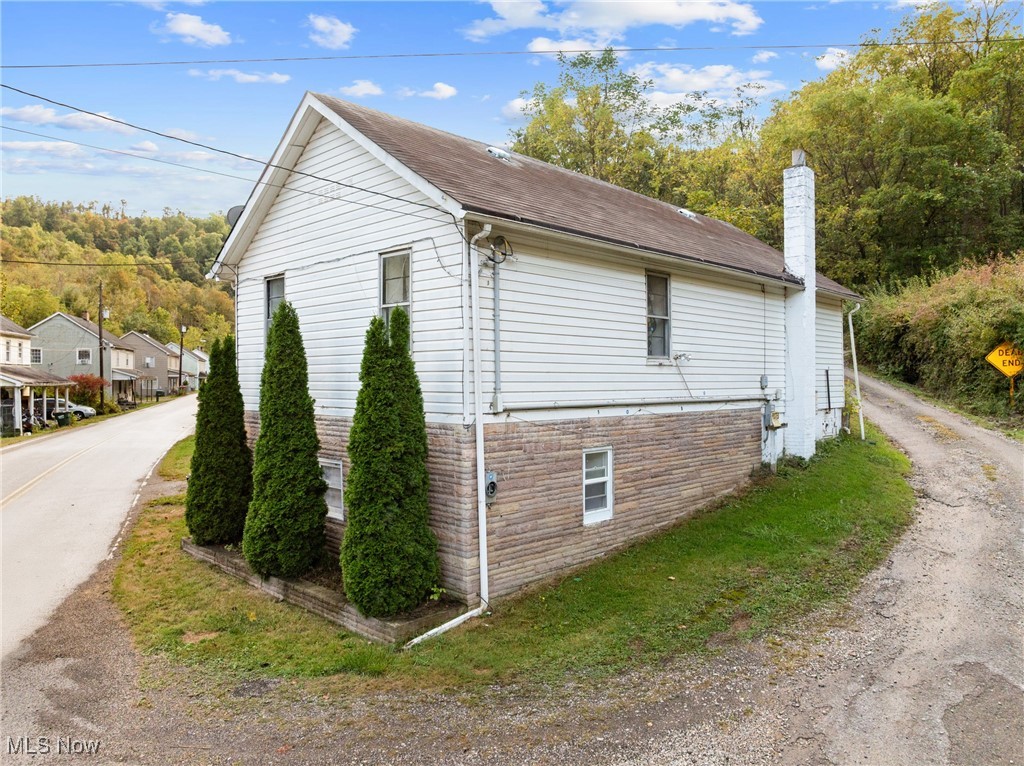 Welcome to this charming 2-bedroom, 1-bath home situated on a spacious corner lot. Located in the country, yet just a short drive into town, this property offers the best of both worlds—peaceful rural living with nearby convenience. Inside, you'll find a cozy layout perfect for those just starting out, looking to downsize, or anyone in need of flexible living space. Don’t miss this great opportunity to own a move-in ready home!