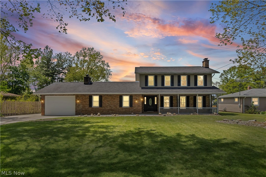 This beautifully updated Colonial-style home offering a blend of character, functionality, and modern updates. The welcoming entryway opens into the dining and kitchen area with an open-concept feel, highlighted by natural light from the sliding glass door and a charming brick fireplace in the dining space. The kitchen includes an additional sitting area and flows into the spacious living room featuring a second fireplace and convenient access to the attached 1-car garage. With one bedroom and a half bathroom on the main level, plus three additional bedrooms and a full bathroom upstairs, this home offers a flexible layout with space for a variety of needs. Fresh interior paint and new vinyl flooring provide a clean, updated feel throughout. Situated on approximately 0.63 acres, the property offers a generously sized backyard with plenty of room to enjoy outdoor living, entertaining, recreation, or future possibilities. A combination of classic style, recent updates, and spacious indoor and outdoor living areas makes this property one you won’t want to miss. Buyer to verify all information, measurements, and suitability for intended use.