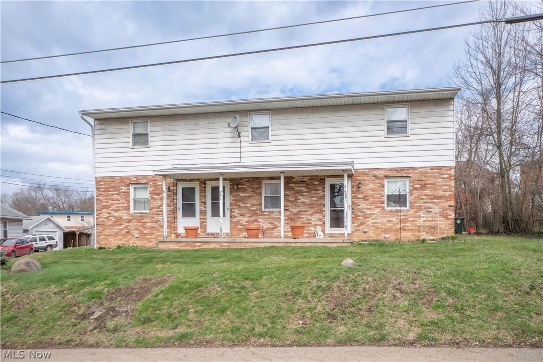 Solid brick triplex offering three 2-bedroom units with separate entrances and on-site parking. Each unit features a carpeted living room, kitchen, half bath on the main level, plus 2 bedrooms and a full bath upstairs. Full unfinished basement provides laundry area and additional storage. Public water and sewer, forced air heat, central air, and privacy fence. All three units are currently rented month-to-month, creating a great income-producing opportunity. Convenient Canton location, short distance to highway, shopping and more.