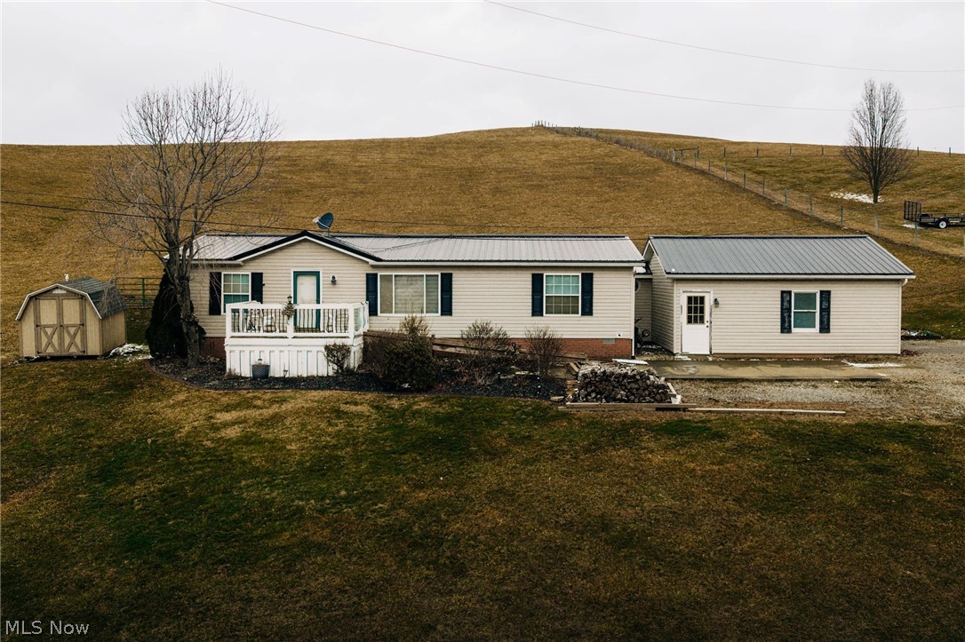 Well maintained 3-bedroom, 2-bath home situated on nearly half an acre with peaceful country views in every direction. Recent updates include new flooring, partial kitchen upgrades, updated bathroom vanities, and major mechanical improvements such as a newer roof, furnace, A/C unit, and hot water tank, offering a peace of mind for years to come. The property features a spacious two-car garage and plenty of outdoor space to relax, entertain, or simply enjoy the quiet surroundings. Conveniently located just minutes from Roscoe Village, this home offers the perfect balance of rural charm and accessibility.