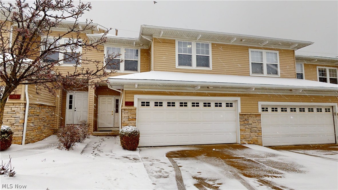 Stunning contemporary 2 level home with modern updates! The kitchen has newer countertops, backsplash, stainless steel appliances, double sink and a pantry. This kitchen, with loads of storage and under-cabinet lighting, blends perfectly to the open concept dining room and living room. The high ceiling living room with 7 large windows provides an abundance of natural light. The living room also has a newly designed wall with beautiful fixtures and a new high end fireplace. The fireplace features a smart remote which controls (among other things) the height of the flames and the intensity of the fan. On the second level there are three  bedrooms with ample closet space, 2 full baths plus additional closet storage spaces. The spacious master bedroom has its own bathroom with Jacuzzi soaking tub, separate shower and dual sink vanity. A large walk-in closet is attached to the bathroom which makes bathing and getting dressed a "one stop shop". There is also potential for further development