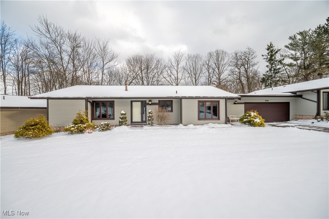 Welcome to charming Brecksville, OH, where elegance meets convenience in this stunning 1,740 sq ft residence. This home offers a seamless blend of style and function, all on one level. 

Step inside and feel the open flow of the spacious living area, where sunlight pours through tall windows, casting a warm glow on the inviting fireplace, a perfect spot for cozy evenings. The open concept design is ideal for both entertaining and serene living, with the gentle hum of a quiet, peaceful street enhancing your everyday experience.

Imagine enjoying your morning coffee on the back patio, surrounded by meticulously maintained grounds, all cared for by the HOA. The well-appointed kitchen and dining area beckon for lively gatherings or quiet dinners alike.

The master suite is a private retreat featuring a luxurious walk-in closet and a master bath designed for relaxation. A second bedroom and full bath offer ample space for guests or a home office. Practicality meets luxury with main-level laundry, ensuring ease and efficiency in your daily routine.

The attached garage, with durable epoxy gravel flooring, adds both convenience and style. Every detail has been thoughtfully crafted for comfort and low-maintenance living, allowing you to focus on what truly matters.

Whether you're seeking a peaceful sanctuary or a vibrant hub for entertaining, this home delivers. Experience the perfect balance of warmth and sophistication, and embrace the lifestyle you've been dreaming of. Welcome to your new home.