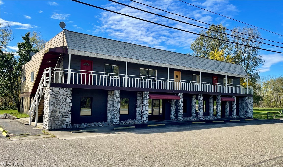 Mixed use commercial space right off interstate 77. The downstairs is currently configured as 4000 sqft of office space with kitchen area, conference area and multiple individual office spaces with A single car garage at the rear of the building  The upstairs has finished apartments that can be configured to accommodate up to 4 individual units. The property is situated on a 2 acre plot with an additional 1 acre parcel right next to the building. Large paved parking lot with room to expand. Call today to get a personal tour scheduled soon!
