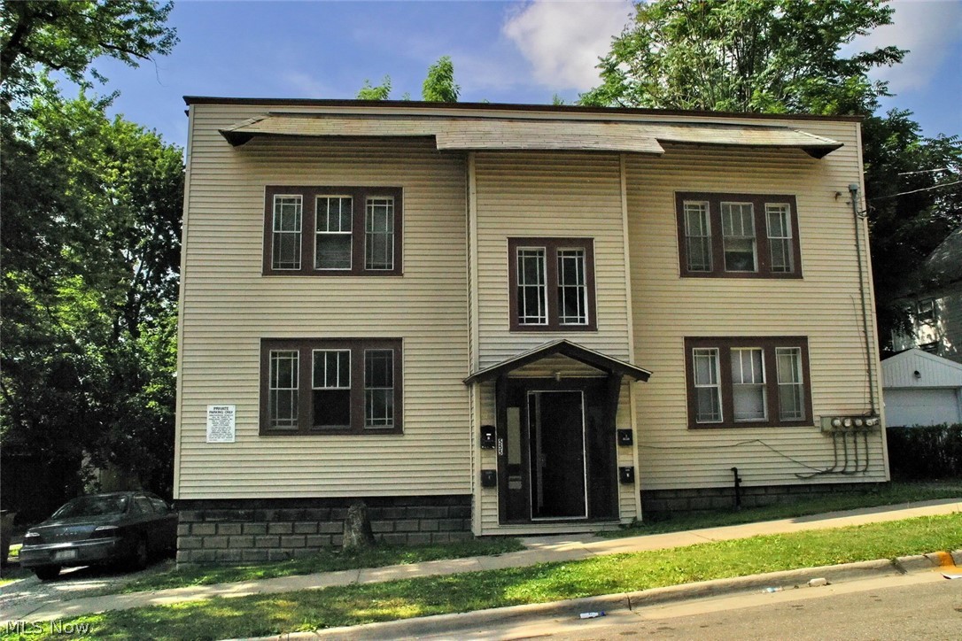 Unique 4-unit apartment for sale. The owner only pays for trash and hallway light. Everything else, including water, is the tenant's responsibility. Located at right access from the Akron Zoo. Surrounded by new development housing. Each unit has 2 bedrooms, 1 bath, and a kitchen with a balcony. All units are identical.