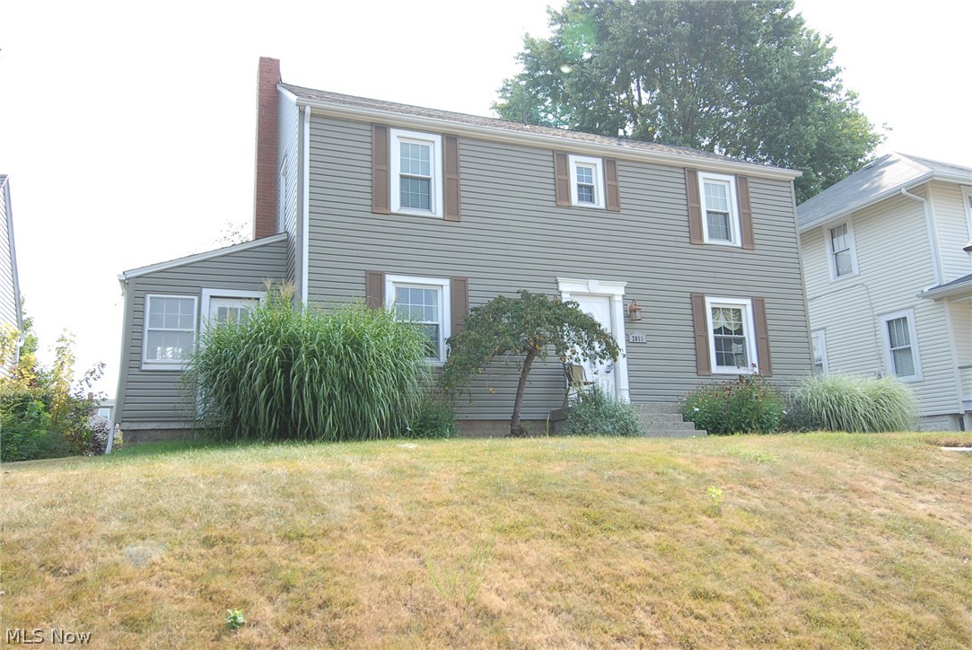 This home is "Charming" - 3 bedrooms, 1.5 baths with all the extras - The spacious living room offers custom drapes, hardwood floors with a gas fireplace.  There is a sunroom with tile floor off the living room.   Dining room has crown molding and hardwood floors.  New kitchen with all appliances, corian counters and tile floor.   The large master bedroom has double closets.  The home has new roof, windows, vinyl siding and gas furnace.  Back yard patio with a gas grill.