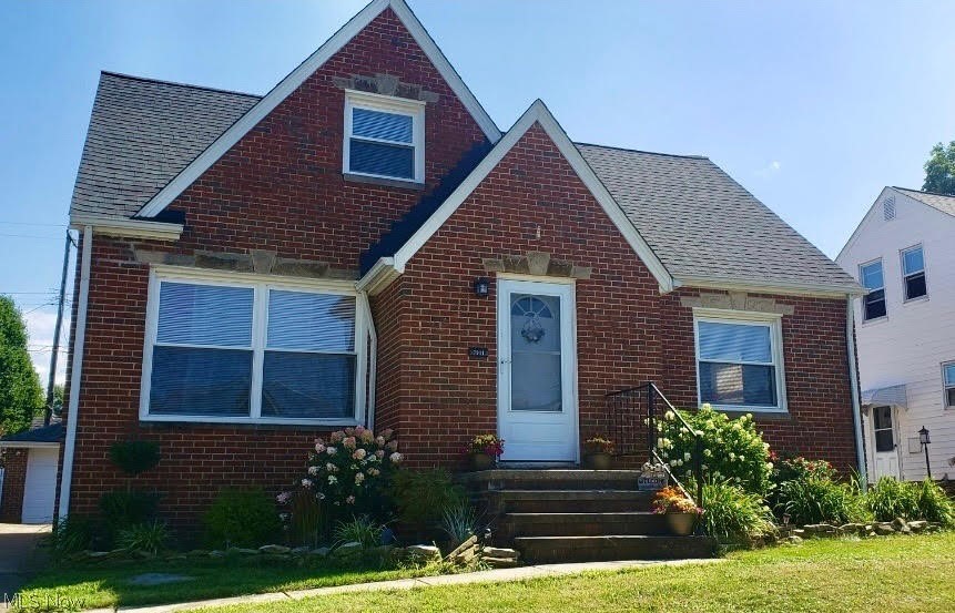 This move in ready, 3-bedroom, 2 full bath brick Bungalow/Cape Cod with 2 car detached Garage is a hidden gem sitting on a lot with mature trees in the heart of one of Parma’s most desired neighborhoods. This updated home boasts a beautiful eat in Kitchen overlooking the back yard, with newer cabinets, stainless-steel appliances, counters, and tile backsplash. Flowing off the Kitchen are the cozy Living Room, 2 large Bedrooms and updated full Bath all with fantastic natural light throughout. The 2nd floor Owner’s suite holds a cozy Office/Bonus Room and large Bedroom with full Bath en-suite. The lower level has glass block windows, throughout, a Recreation Room with bar and the Laundry/Mechanical Room with washer, dryer, updated mechanicals (Furnace 2015, A/C 2017, Hot Water Tank 2013) and electric panel. The home was waterproofed in 2017.