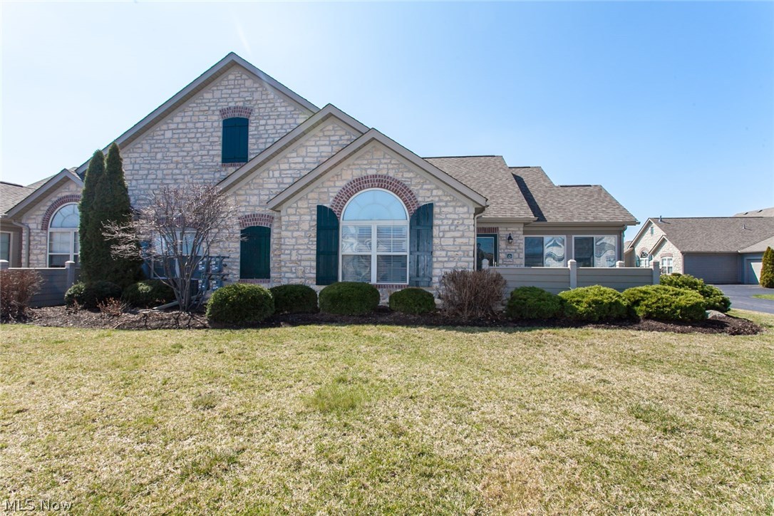 Freshly Updated Fairway Villas condo! Enjoy the CAREFREE LIFESTYLE in this ABBEY style Villa surrounded by Catawba Island Clubs Arthur Hills Champ Golf Course! If you choose to be a CIC member (membership is optional), it is just a short golf cart ride away to this Lake Erie Resort Paradise. This home is comfortable and efficient for everyday living with single story living, 2 large bedrooms, large sunroom plus 2-car garage and golf cart parking. Situated nicely in the community, this condo has a great patio setting with a peek of the Golf Course! Upgrades including a large kitchen with granite tops, tile back splach, open airy 4-season sunroom, tiled showers, some fresh paint, wood/laminate flooring in main area, large closets and window treatments throughout to name a few. Just steps to the beautifully appointed clubhouse, with swimming pool and fitness center. Great value at Fairway Villas!