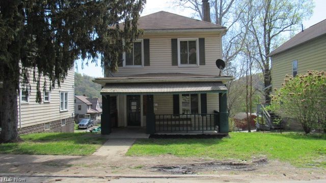 This two story  home offers all the charm and potential you are looking for.  The main level provides living room, dining room, kitchen, family room and half bath.  The second floor offers 2 bedrooms  and full bath. Added additions include a full basement and 2 car garage.    Bring your imagination and decorating ideas and make this home shine to its fullest potential. Call today to schedule your showing