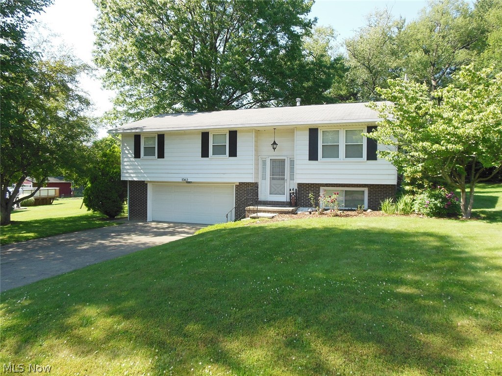 Country Feel Yet Minutes from Washington Square. Nice starter 3 bedroom home on .563 acre. Master has half bath. Large deck overlooking woods. Side lot has storage shed. Rec room bar on lower level. Some updates including furnace, A/C. Sliding door to deck has fresh paint.