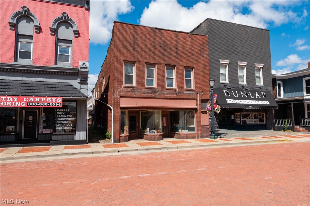 Beautiful old Historic Business in Beautiful Historic Downtown Minerva has so many possibilities with the property! The 1st Floor Features a Retail Business or Office Area that is 20'x 51' deep plus a 10'x19' full bath on the first floor bathroom , 10'x 12' room is behind the retail space and the 10'x19' back room(would make a great office space)! The 2nd Story Features 2 Apartments with separate entrances! This could make an Ideal Owner Occupied Business Living above Your Business while receiving Income from another tenant. OR Simply just a Great Investment property with 2,000 Sq Ft. of Retail Space on The 1st Floor and 2,000 Sq Ft of Apartments on the 2nd Floor. Contact Listing Agent for Special SBA Financing with Low to No Down-payment for Qualified buyers!