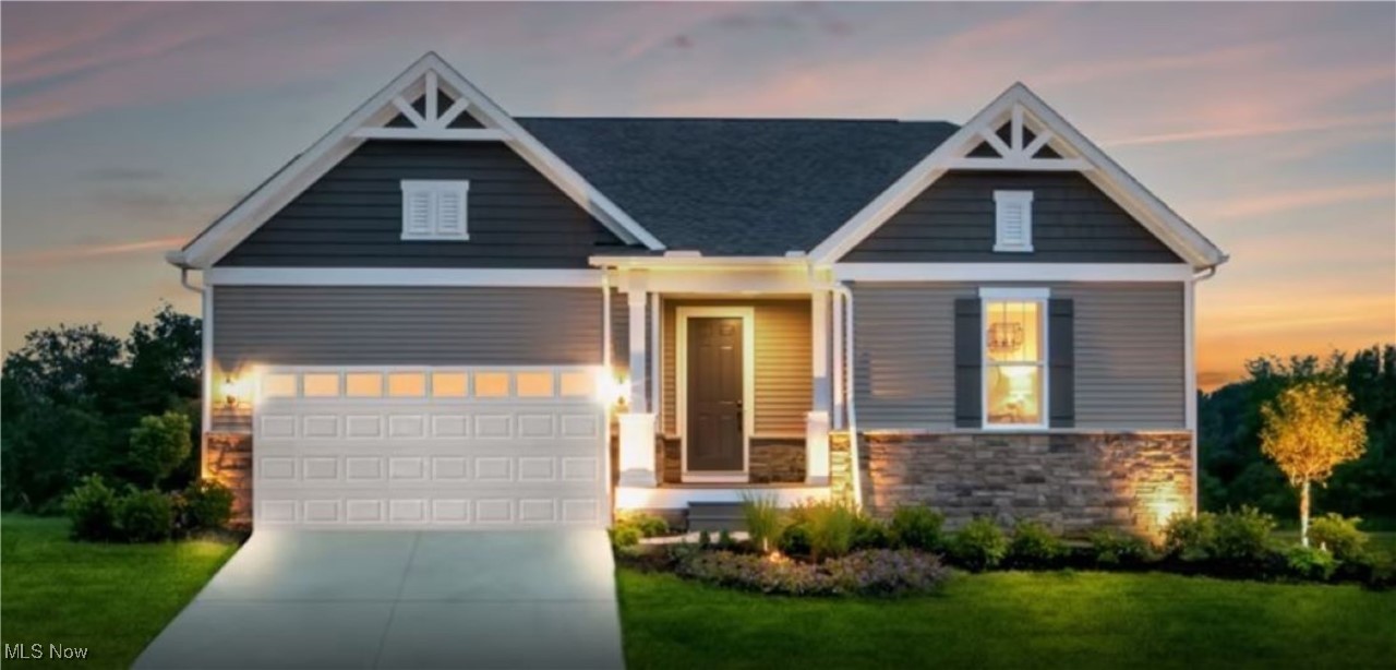 Welcome to your dream home in the highly sought-after community of Green! This beautiful Countryview model is now available and ready to impress. Conveniently located a mile from fantastic shopping & delightful parks, & only minutes away from top-rated medical care, this home offers both comfort & convenience. Step inside & be captivated by the inviting floor plan that features a cozy fireplace, perfect for those chilly evenings. The spacious great room, adorned with high ceilings, provides an airy ambiance. The covered patio, with serene pond views, provides an ideal spot for relaxation or entertaining guests. The spa-like owner’s bathroom boasts a lovely tile shower, elevating your daily routine into a luxury experience. The chef in your family will love the meticulously designed kitchen, outfitted with upgraded built-in appliances & a stunning designer island, while the expansive walk-in pantry offers ample storage for all your culinary needs. Enjoy the practicality of a first-floor laundry room, complete with additional cabinets & a utility tub for your convenience. As you explore further, you'll appreciate the grand stone exterior and formal entryway that set a sophisticated tone. This charming community is nestled in a tranquil setting, with lawn care & snow removal included, allowing you more time to enjoy the finer things in life. Don't miss your chance to own this exceptional home that combines luxury with low-maintenance living. Schedule your private tour today!