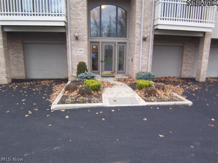 Easy living at its finest.  This 2 bed 2 bath ranch condo is conveniently located near Interstate 77.  The building is equipped with an elevator.  Enjoy the view of the pond from the private deck.  All of the stainless steel appliances will be included in the eat in kitchen.  There are two fireplaces, a laundry room inside the unit, and a master suite with walk in closet.  This unit has a garage access with additional storage area.  The Enclave at Rosemont Ridge has a clubhouse with workout area, sauna, dining hall with bar, laundry facility,  and a recreational living area with a fireplace.