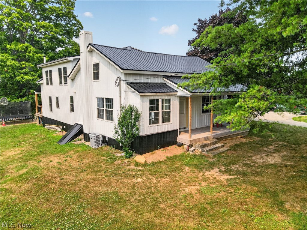 Stunningly remodeled Century Home situated on 4 picturesque acres in the Berkshire School District! Blending historic charm with modern luxury, this custom-designed home has been thoughtfully updated throughout with exceptional attention to detail. The spacious floor plan offers 4 bedrooms and 2.5 bathrooms, including a beautiful primary suite that serves as a private retreat with a luxury en-suite bath featuring high-end finishes and custom craftsmanship. Three additional bedrooms provide ample space for family, guests, or a home office. The heart of the home is the custom-designed kitchen, complete with quality cabinetry, stylish finishes, and a large center island perfect for meal preparation, entertaining, and gathering. The adjoining dining room has a wood burning stove and sliders to the wraparound porch with breathtaking views of the pond, surrounding nature, and creates the perfect setting for everyday meals or special occasions.The impressive vaulted living room offers an open and airy feel, filled with natural light and showcasing the home's unique character and design. Every room reflects the care and quality that went into this complete renovation.Outside, enjoy the beauty and privacy of 4 acres surrounded by mature trees and scenic views. A large outbuilding provides incredible versatility with heated floors, electric, 1/4 bath and includes a finished upper-level space ideal for a studio, office, recreation room, guest space, or hobby area. Two attached carport/overhangs offer additional covered parking and storage for vehicles, equipment, or recreational toys. Outside wood-burner is currently ran to the outbuilding and plumbed to the house ready to be hooked up. A rare opportunity to own a beautifully renovated historic home with acreage, versatile outbuildings, and modern amenities all in a peaceful country setting.