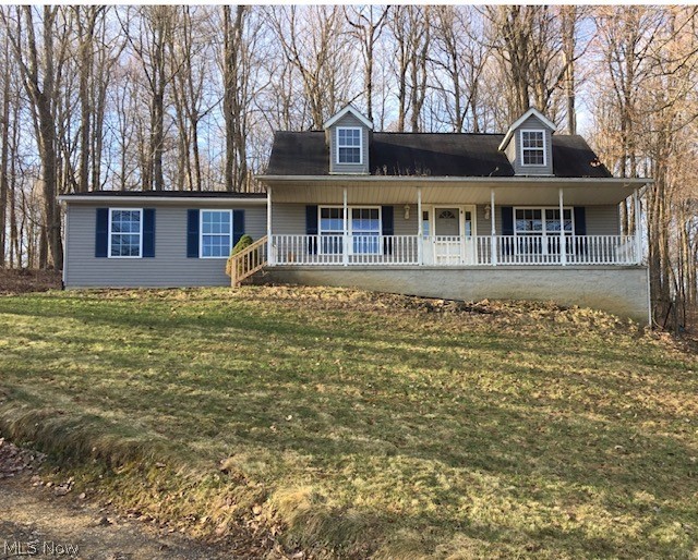 Make this home with a little TLC. Large eat-in kitchen, some wood floors, 2 car attached garage on 1.5 acres.