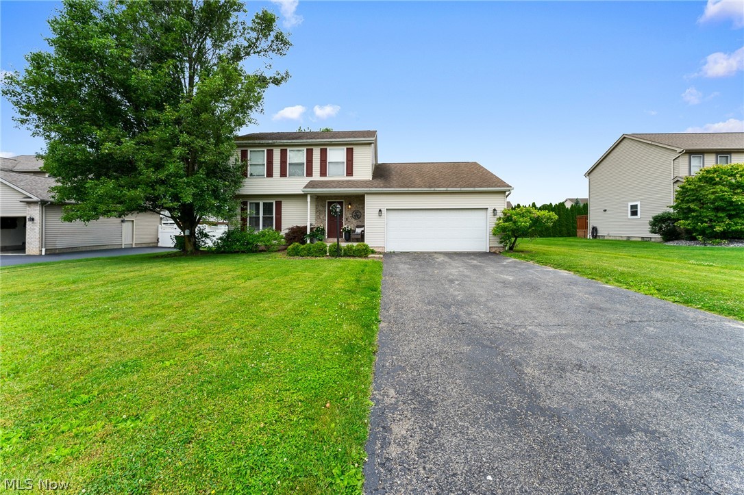 Welcome to this well-maintained 3-bedroom, 1.5-bath home in the desirable Carrousel Corners neighborhood! The spacious main level features a warm and inviting family room with a cozy fireplace, a large eat-in kitchen complete with all appliances, a formal dining room perfect for entertaining, a convenient laundry room, and a half bath.

The second floor offers three comfortable bedrooms and a full bath, providing ample space for family and guests. A full basement adds plenty of storage and offers endless possibilities for future finishing.

Situated on over one-third of an acre, this property offers outstanding outdoor living with a welcoming front porch, a partially covered rear deck, a storage shed, and a two-car attached garage. With its functional floor plan, generous lot, and desirable location, this home is ready for its next owner to enjoy!