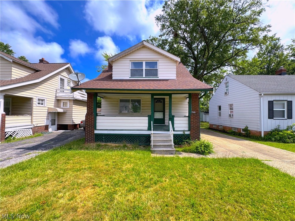 Welcome to 1505 E 196th St in Euclid! This charming Cape Cod offers a comfortable layout, bright living spaces, and a manageable footprint that works well for both owner-occupants and investors. The home features 2 bedrooms, neutral interior finishes, a functional kitchen with ample cabinet space, and a living room with built-in shelving and a fireplace focal point. Enjoy the covered front porch, usable yard space, and the added benefit of a detached 2-car garage offering off-street parking, storage, or workspace potential. Conveniently located near local amenities, shopping, schools, parks, and freeway access, this home is a great opportunity with practical features and strong everyday appeal.