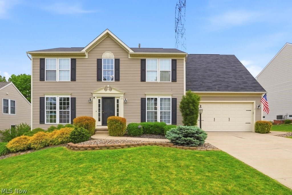 Welcome to this spacious Colonial in the desirable Tinkers Green community of Streetsboro.  With 4 bedrooms, 2 full and 2 half baths, this home offers over 3,000 square feet of finished space.  Upon entering, a two-story foyer greets you with a dedicated dining space on one side and a den on the other. Whether you need an office, playroom or hobby space, the den offers plenty of flexibility to fit whatever your needs may be.  Through the foyer is the eat-in kitchen with stainless steel appliances, a center island and plenty of cabinet and counter space.  Sliding glass doors off the kitchen lead directly to the backyard creating seamless indoor/outdoor living.  A convenient half bath and access to the two car garage complete the main level.  Upstairs, you'll find 4 generously sized bedrooms, including a huge primary suite with vaulted ceilings, two walk-in closets and en-suite bath featuring a double vanity, tub and stand-up shower.  The other full bathroom, which has a shower/tub combo, is also on this level.  Newer paint and recessed lighting throughout much of the home give it a fresh, move-in-ready feel.  The finished basement features an impressive wet-bar setup and adds significant living space, ideal for entertaining.  With an additional half bath, the basement is a perfect spot for hosting family and friends while still reserving plenty of storage space.  Outside, the backyard is a private and peaceful space to unwind. It features a great deck stepping down onto a concrete patio, rounding out what truly is an exceptional home for hosting, relaxing, or anything in between.  Not just a great home though, but a great location too with it's close proximity to stores, restaurants and major highways.  If you've been looking for a move-in ready home that you can enjoy both inside and out, this is an opportunity you won't want to miss!