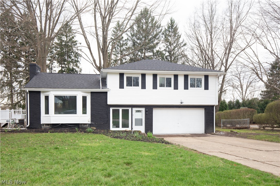 Come see this completely renovated split-level home! It has four nice bedrooms, also has two renovated full bathrooms and a half bathroom with a laundry area. The home has new paint throughout, as well as new vinyl and carpet. The home has a nice-sized deck on the side.
