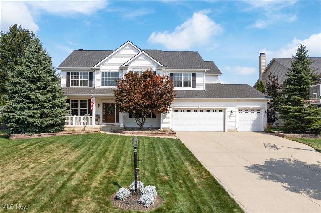 Checkout this stunning 5 BR, 3.5 BA updated Colonial located in the prestigious West Chase Landings neighborhood.  Home has over 4,000 sq. ft. of finished space and make sure you pay attention to detail as you walk through as this one has too many updates/upgrades to list all.  You will notice the manicured lawn w/sprinkler system as soon as you pull in the oversized concrete driveway w/3 car garage. There is a sidewalk wrapping  all the way to the fenced rear yard and you will see the maintenance free deck leading to the massive patio area w/fire pit.  Amazing outdoor space great for entertaining w/all new landscaping in 2021.  As soon as you walk in you will notice the open grand entrance w/fresh neutral colors.  First floor offers an open concept w/large eat-in updated kitchen w/stained cabinets, granite counter tops and tiled back splash in 2019. Walk-in pantry off kitchen.  First floor also has living room w/fireplace, laundry room, office, half bath and dining room.  As you walk upstairs you may notice the new railing, banisters and newels in 2021. Upstairs offers 3 good sized rooms w/full bath w/double sinks and granite countertops. Master BR is amazing at 20 x 20 w/13 x 6 walk-in closet w/built-ins and new master bathroom in 2018 w/tiled shower, glass doors & double sinks w/granite.  Walk-out lower level was remodeled in 2021 and offers 5th BR, large rec room w/bar/kitchen area, work out room (possible 6th BR), full bath plus storage area/workshop. Walk-out basement to patio.  Other updates/features include whole house interior/exterior sound system, roof 2018, custom closet systems 2020, HWT 2023 & more. With so many updates - just unpack and enjoy.  This one will make an amazing house to call home!