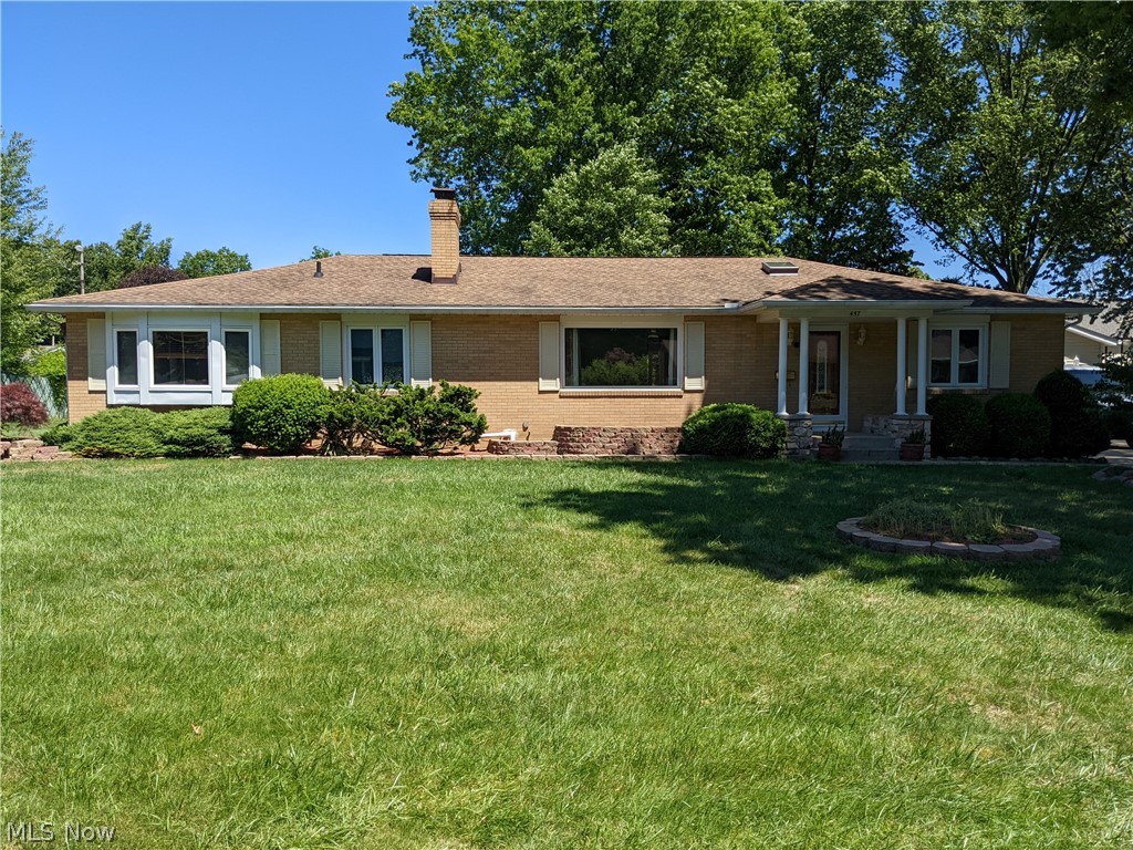 The three full baths make this sprawling ranch pretty rare. It sits on a great lot in the Harves Woods Park area with a full two car garage that includes ample built in storage. Entrance from the garage to the kitchen/family room area is handicap accessible. The front living room with a large picture window and fireplace is right off the ceramic floor kitchen with stainless steel appliances. Beyond the kitchen, you will enter into the large family room that has built-in shelving and a gas fireplace. The primary bedroom/bath on the north side of this home features a spacious walk-in closet. Two other bedrooms are on the opposite side of the house. One of those bedrooms has an attached bath. The basement has a rec area and separate work room.  Several rooms have skylights which bring in extra light. Roof replaced in 2010. Incredible opportunity for single floor living in a great neighborhood.