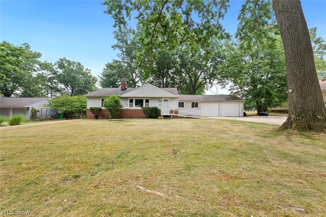 Welcome home to this beautifully updated 3-bedroom, 2-full-bath ranch offering comfortable one-floor living with the added bonus of a partially finished full basement. Inside, you'll find durable luxury vinyl flooring throughout and a modern neutral gray color palette that complements any style. The bright kitchen features attractive stone countertops, ample cabinet space, and a window overlooking the backyard, bringing in plenty of natural light while you cook. Just off the attached garage is a versatile office/breezeway, perfect for working from home, a mudroom, or additional flex space. A hallway off the kitchen provides convenient access to both the exterior entrance and the basement. Downstairs, the partially finished lower level expands your living space with a comfortable family room, bedroom or guest area, and a second full bathroom, making it ideal for visitors, multi-generational living, or a private retreat. With a functional layout, tasteful updates, and plenty of flexible living space, this move-in ready ranch is one you won't want to miss!