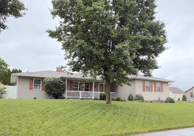 Discover the perfect combination of comfort, style, and efficiency all on one floor in this beautiful ranch home located in a highly desirable area! Nestled on a private, fenced-in corner lot, this home offers spacious living both inside and out. There are 3 bedrooms, 2 full baths, a main floor laundry room, and a 2-car heated attached garage. Step inside to an inviting open-concept layout featuring vaulted ceilings, lots of natural light, and a gas fireplace that creates the perfect gathering space in the living room. The kitchen includes all the new stainless-steel appliances and a center island. The private master suite includes a walk-in closet and its own full bath with all new fixtures and a double shower. The two additional bedrooms provide plenty of space for family and a home office. The full basement is stubbed for a full bath and offers endless possibilities for storage or future finishing opportunities. Outside, enjoy the covered back deck and new cement patio along with the fenced in level yard. This home has an additional bonus of 11 solar panels to help improve energy efficiency and reduce utility costs. Recent updates include all new floors in 2025, a new roof and hot water tank in 2024, solar panels 2025, and a new garage door.  This move-in-ready ranch combines modern comfort with practical features in a fantastic location.