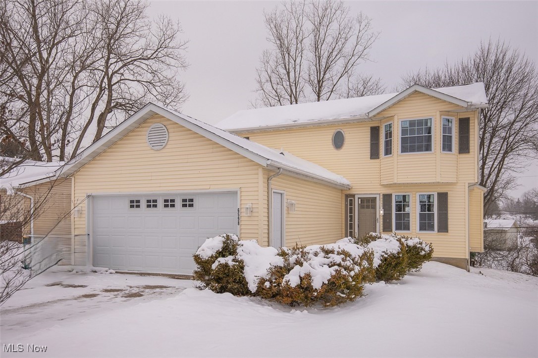 Welcome home to this beautifully renovated colonial in Oakwood Village, offering 1,588 sq ft of stylish living space with a 2-car attached garage and an open, functional layout. This 3-bedroom, 2 full and 1 half bath home has been thoughtfully updated throughout and is truly move-in ready. The main level features a bright open floor plan, enhanced by fresh paint, new lighting, and new LVP flooring, perfect for both everyday living and entertaining. The brand-new kitchen is a showstopper, complete with granite countertops, stainless steel appliances, a wine cooler, and modern finishes. Washer and dryer are included for added convenience.
Upstairs, the spacious primary suite offers a private en-suite bath, while all three bathrooms have been fully renovated with contemporary design and finishes. The finished basement adds valuable living space with a recreation area, bar, and ample storage, ideal for entertaining or relaxing. Major mechanical updates provide peace of mind, including a new roof (2023), air conditioner (2023), hot water tank (2023), and new furnace (2025), along with some newer windows. Conveniently located close to highway access and local amenities, this home combines modern updates, functional space, and a prime location. Don’t miss this opportunity to own a turnkey home in Oakwood Village—schedule your private showing today!