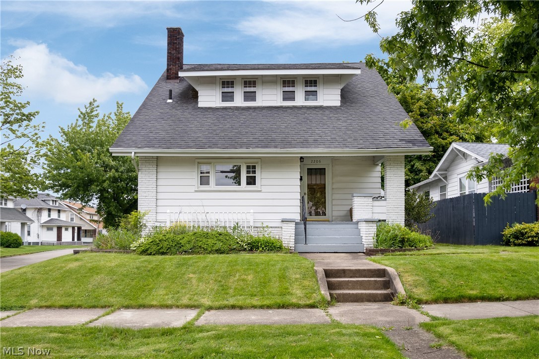 Beautifully updated and move-in ready, this charming home offers the perfect blend of character and modern convenience. The eat-in kitchen features quartz countertops, tile backsplash, and plenty of cabinetry, while the spacious living and dining rooms provide great entertaining space with a cozy fireplace. Upstairs includes 3 generously sized bedrooms with new carpet and an updated full bath with a classic clawfoot tub. The full basement adds potential for additional living space with a full bath, and laundry area. Throughout the home you will notice fresh paint, updated flooring and lighting, newer water heater (2020), and a new gas furnace (2026) providing added peace of mind. Large 2-car detached garage, inviting front porch, and convenient location near schools, parks, shopping, and dining make this a must see!