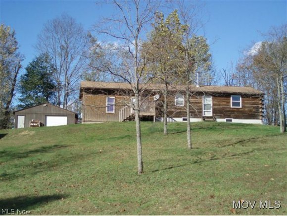 Reduced - Beautiful Views!!  Ranch log on full basement with an attached addition.  Detached 24x24 garage and small barn.  Basement walls have been reinforced with guarantee and engineer's report from Basement Systems of WV. (Geo-Lock Anchors)  There are two rooms partially finished in basement - previously an office and bedroom prior to basement repair. Great hunting or full time residence with privacy.  Elem: Harrisville Elementary School  Elem/Bus: Y  JrHigh: Ritchie County Middle School  JrHigh/Bus: Y  High: Ritchie Cty. High  High/Bus: Y  Fire: VOL  Police: SHF  PossFreeGas: N  ;SQFT=Fin L1:1393, Fin Above:0, Fin Total:1393, Unfin Bsmt:864, Unfin Above:864;GAR= 1 Car Det