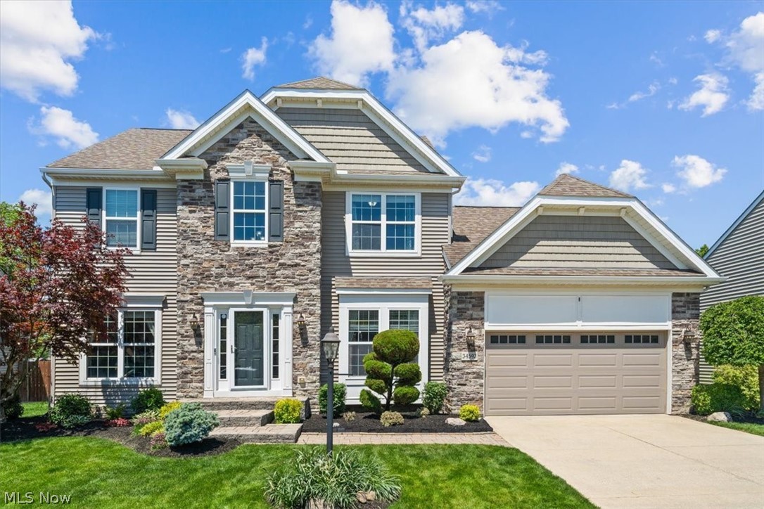Welcome HOME to 34592 Braemore Drive—an exceptional, custom-feel residence loaded with thoughtful upgrades. From the moment you enter the 2-story foyer, you’ll notice rich crown moldings, detailed woodwork, and beautiful hardwoods that continue through the den, dining room, kitchen, sunroom, and the second-floor hall.
At the front of the home, a versatile den with pocket glass doors pairs perfectly with the elegant dining room featuring a tray ceiling, crown molding, chair rail, and wainscoting. Toward the rear, the great room welcomes you with a warm gas fireplace framed by gorgeous millwork and flows seamlessly into a beautifully customized kitchen. Enjoy granite countertops, a tile backsplash, island, pantry, stainless steel appliances, and crown moldings—everything today’s cook desires—opening to a vaulted morning/sun room that overlooks the spectacular backyard.

Step outside to an entertainer’s oasis: a paver patio, pergola, and storage shed create an inviting space for gatherings, grilling, and relaxing. Back inside, the first floor is rounded out by a convenient half bath and a customized first-floor laundry room.
Upstairs, you’ll find three spacious bedrooms and two full baths. The luxurious owner’s suite is a true retreat with a vaulted ceiling, crown molding, walk-in closet, and a spa-like bath featuring a dual vanity, tile shower, and soaking tub.
And then—an incredible basement designed for living and entertaining. A full guest suite pairs with a full bathroom for comfortable overnight stays or multigenerational flexibility. The expansive rec area centers around a second fireplace and a full wet bar with a mini fridge—perfect for game days and movie nights. A dedicated 14' by 15' workout/hobby room will give you no excuse to skip leg day. This gorgeous home truly has all the bells and whistles and a one-of-a-kind custom feel throughout.