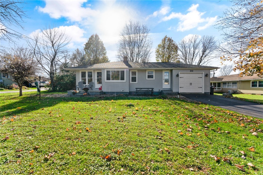 212 Hillman offers a beautiful ranch in Cortland near Lakeview Schools. This 2 Bed, 1 Bath house is definitely larger in person than on paper! The galley style kitchen offers plenty of cabinet space with laminate countertops and black appliances. The spacious living room has newer carpet, tons of natural light and access to the front patio. The 2 bedrooms are nested in the back with one have hardwood flooring and a back access to the deck and backyard while the other bedroom has carpet and 2 closets, one being a walk in closet. The full bathroom has a tub surround, vinyl flooring and a modern vanity with a vessel sink. The basement hosts a partially finished room with carpet, ideal for a secondary living space and tons of storage throughout. 100 amp service. Hi-efficiency furnace and new AC. New Richmond Hot water tank. Vinyl siding and windows. Glass blocks with vents in the basement. Dimensional shingled roof. 1 car attached garage. Walking distance to Lakeview Schools. Don't miss ou