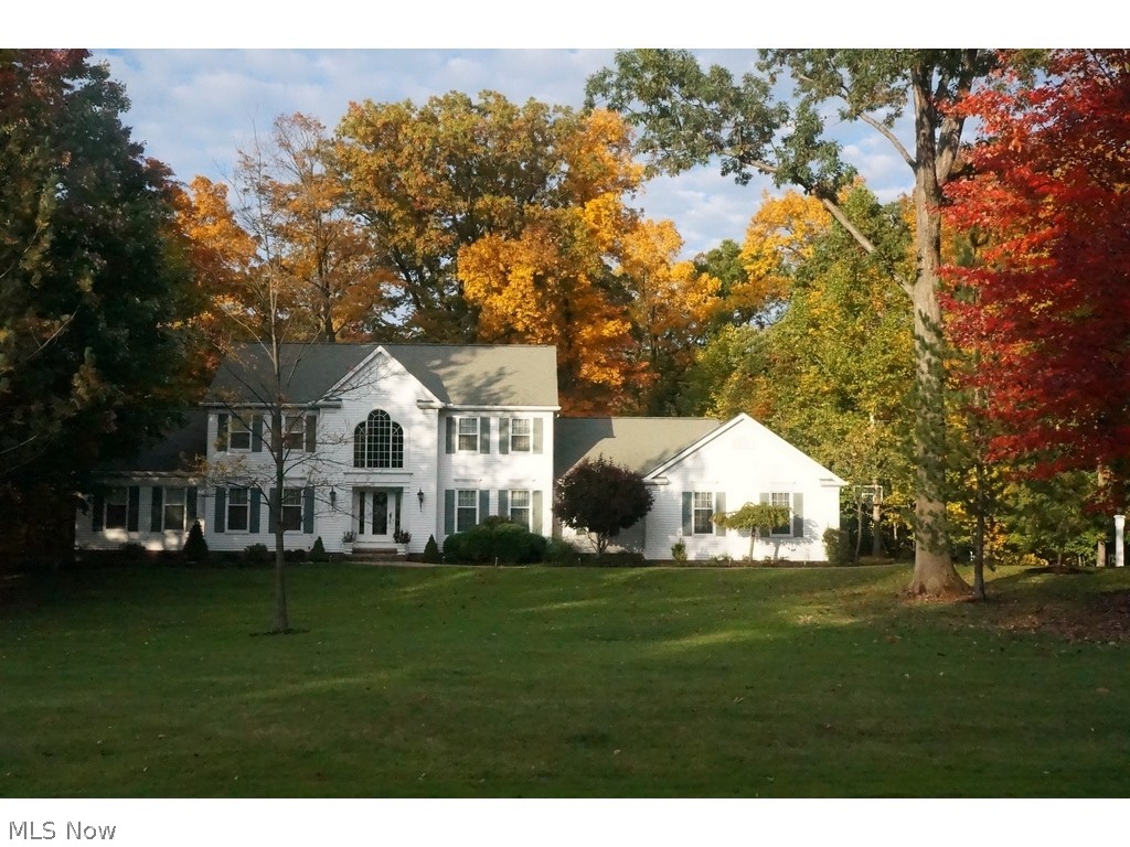 Well-maintained home ON 3.01 wooded acres, country living but minutes TO freeway and shopping, beautiful kitchen w/wolf double ovens and range top, sub zero fridge, drawer microwave IN the granite center island, travertine tile floor IN kitchen, 1ST floor master w/glam bath, heated floor and heated tub, sunroom and den w/custom stained glass barn doors, great fin bsmt w/bath/sauna exercise room, office/craft area, game RM, TV RM, nice paver patio, 912 sf 3 car garage w/direct access TO basement, 4 zone furnace, 22KW generator, steps down TO ravine/creek. Newer roof, driveway, furnace, carpet. Remodeled fireplace w/sandstone hearth and gas logs.