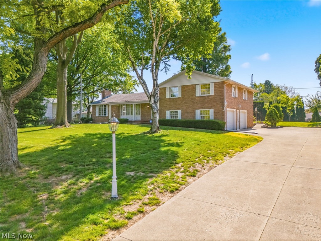 Welcome home to this gorgeous, brick split-level offering over 2,700 square feet of living space, tucked away on a private dead-end street! From the moment you enter, you’ll appreciate the spacious living room featuring oversized Pella windows that fill the space with natural light, along with a charming decorative fireplace.
The beautifully designed kitchen offers abundant storage with custom Schrock cabinetry complete with roll-out shelving, hard-surface countertops, a pantry, and a double oven—perfect for cooking and entertaining.
Relax in the cozy family room featuring a gas fireplace, built-in shelving, and a built-in storage bench. Just beyond, the enormous sunroom provides the perfect gathering space for family and friends while overlooking the peaceful, park-like backyard.
Love spending time outdoors? Enjoy your oversized covered deck or unwind in the gazebo, all surrounded by mature trees on a beautifully landscaped 0.6+ acre lot complete with a charming brick paver pathway.
The lower level offers a spacious laundry room and convenient access to the side-load two-car garage. The basement provides endless possibilities with abundant storage and extends beneath the sunroom for even more usable space.
Upstairs, the owner’s suite features a walk-in closet and private en-suite bath. Two additional bedrooms include generous closet space, with one also offering a walk-in closet. The main bath includes access to attic storage for added convenience.
Ideally located near the Belden Village Mall, shopping, dining, and major highway access, this exceptional property combines privacy, space, and convenience. Just add your finishing touches and this home is truly fabulous!!