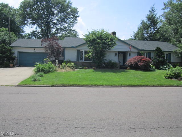 Sprawling ranch waiting for your decorating ideas and full of extras. Newer roof - (complete tear off in 2016), nice vinyl windows. Large rooms, woodburning fireplace in living room. Hardwood floors in kitchen and (eating area =other 10 x 09). This home as has 3.5 baths. His and hers double closets in master. The basement is finished  with a full bath and runs the length of the house and extra finished rooms  to use any way you want, for example: in-law suite, dorm, guest room, office, rec room. Basement waterproofed, sump pump...customize it to fit your needs. Storage Galore. Features a fenced yard, patio, 2 car garage and parking pad for additional cars. Great location close to everything. Appliances in basement stay. SOLD AS IS! Seller will not make any repairs.