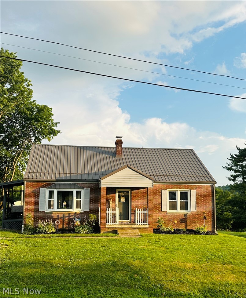 MAIN HOME + GUEST/IN-LAW HOME! The main home is so much bigger than you’d expect! Featuring 4 bedrooms, including a main-level primary suite with an attached study that has been converted into a walk-in closet, 2 full baths, and spacious living areas throughout. Situated in the East Muskingum School District, this property offers space, flexibility, and convenience with easy interstate access. The home includes a finished upper level and an unfinished basement offering a large flex space that was previously a garage and has been converted for additional use, but could be converted back if desired— providing potential for additional living, recreation, or future expansion.  Recent updates within the last 2 years include a new roof & gutters, HVAC system, covered deck, carpet on the stairs and hallway, light fixtures, and fresh paint. A standout feature is the newer 672 sq. ft. guest house, offering 1 bedroom and 1 full bath with a washer/dryer combo—ideal for multigenerational living, guests, or potential rental income. Outdoor living is a highlight, with a side deck that wraps around to a newly added covered porch, creating the perfect space for gatherings and entertaining. This unique property combines space, updates, and versatility—offering endless potential to fit a variety of needs! Owner is a licensed real estate agent.