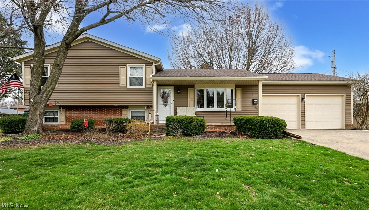 Perfect timing!  Your opportunity to get into the North Canton school district is here!  This fantastic home offers incredible space, with 4 bedrooms and 2 full bathrooms!  Located in a lovely neighborhood that is perfect for a morning run, evening stroll and just a 2 minute bike ride to the High School!  You'll be walking distance to your favorite coffee shops, restaurants and shopping on Main St, plus just a 6 minute drive to Walsh University and 10 minutes to Gervasi Vineyards!  The exterior has had a gorgeous refresh with updated siding, shutters, gutters and roof.  There is a super charming coy pond surrounded by a rock garden, where you can enjoy a peaceful moment watching the fish.  Around back you'll find a great deck, perfect for grilling or a cup of coffee on a beautiful summer morning.  Inside, the main level features a spacious living room with a wonderful bay window, a dining area with sliders to the deck and the kitchen.  Range, refrigerator and stove all stay too!.  This versatile space on the lower level can be huge family/rec room or provide a formal dining space and a cozy area around the fireplace.  There's also a gorgeous full bathroom and bedroom/office.  Granite countertops, tile floor and a custom tile, multi-head walk-in shower make for an impressive guest bathroom!  Back up to the second level for 3 additional bedrooms and the second full bathroom.  All bedrooms are comfortably sized and the primary has private access to the bathroom.  Handsome cabinetry, granite top with a double sink, tiled floor, linen closet and tub shower combo complete this bathroom.  You still have plenty of room for storage in the unfinished basement!  Major improvements include: LVP flooring in family room- 2025, siding & gutters 2024, water heater 2022, furnace 2020, bathroom remodels 2018, A/C 2017, roof 2016, windows 2012, radon mitigation 2012 and updated panel box!  Be sure to get your offers in ASAP!