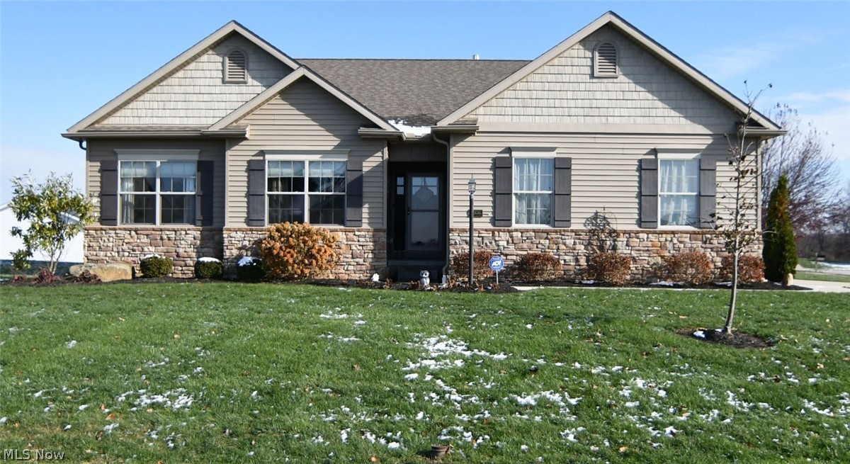 Busy lives lead to easy living at 6976 Emerald Cove Ave NW Jackson Twp. Gorgeous 3 bedroom villa built by award winning Smith  Homes! Foyer entry opens to the generous great room featuring a gas fireplace. Dream kitchen offers granite counter tops, stainless steel appliances,center island with a breakfast bar, and a huge walk-in pantry. Large master bedroom with walk-in closet and adjoining bathroom suite. Two additional bedrooms and a second full bathroom. First floor laundry and a half bathroom complete the living space. Privacy fence surrounds the deck and is accessed through the dining room sliding glass door. Full basement offers many possibilities of  additional living area. Development provides a club house, in-ground pool, pond, tennis courts and walking path. Very walk-able neighborhood with sidewalks and street lights.