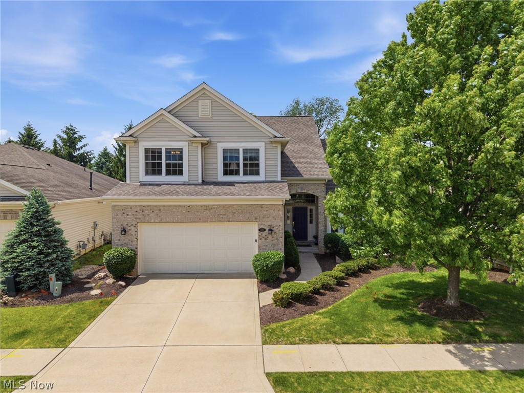 Impressive and beautiful home in Oakmont of Ashley Oaks. Very well maintained and updated with newer furnace, AC, hot water tank, windows, granite countertops, and much more. Included in the sale will be all appliances, security system, generator, and safe. This popular floor plan features vaulted ceilings with a beautiful open staircase going both upstairs and down. Great room gas fireplace adds ambiance. Main floor owner's suite is also vaulted with a luxury bath (double sinks, soaking tub, separate shower) and spacious walk-in closet. Off the dining area is a light-filled sunroom and the first floor also includes a powder room and laundry with included washer & dryer. Upstairs a versatile loft makes a perfect office overlooking the great room below and 2 additional bedrooms and full bath ensure plenty of space for family or guests. The full basement is insulated and pre-plumbed for a full bath and there is an oversized attached 2 car garage. Landscaping and snow removal are provided and the Strongsville location is ideal. Call today to schedule a showing.