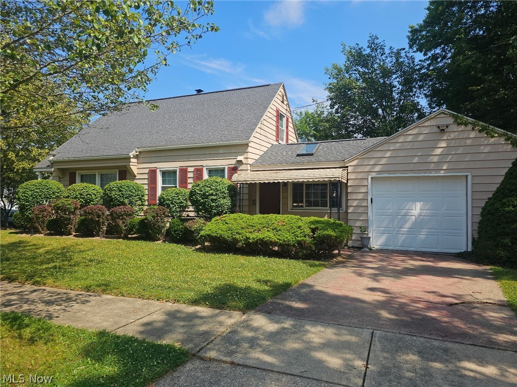 Charming Cape Cod on a private corner lot in desirable Cuyahoga Falls! This well-maintained 3-bedroom, 1 full and 2 half-bath home offers versatile living space, including an upstairs loft that's perfect for a home office, which leads to a spacious primary bedroom with a walk-in closet and private half bath. Enjoy a bright dining room with a skylight, hardwood floors beneath the carpet, and a partially finished, waterproofed basement ideal for a family room, media room, or additional living space. Relax or entertain on the custom stone patio with a permanent gas hookup for grilling in the fully fenced backyard featuring ornamental and fig trees. Additional highlights include new central air (2025), a new water softener, an attached garage with dog run access, and plenty of storage throughout. Conveniently located near shopping, Valley Vista Park, and Cuyahoga Valley National Park. Don't miss this one-of-a-kind home.