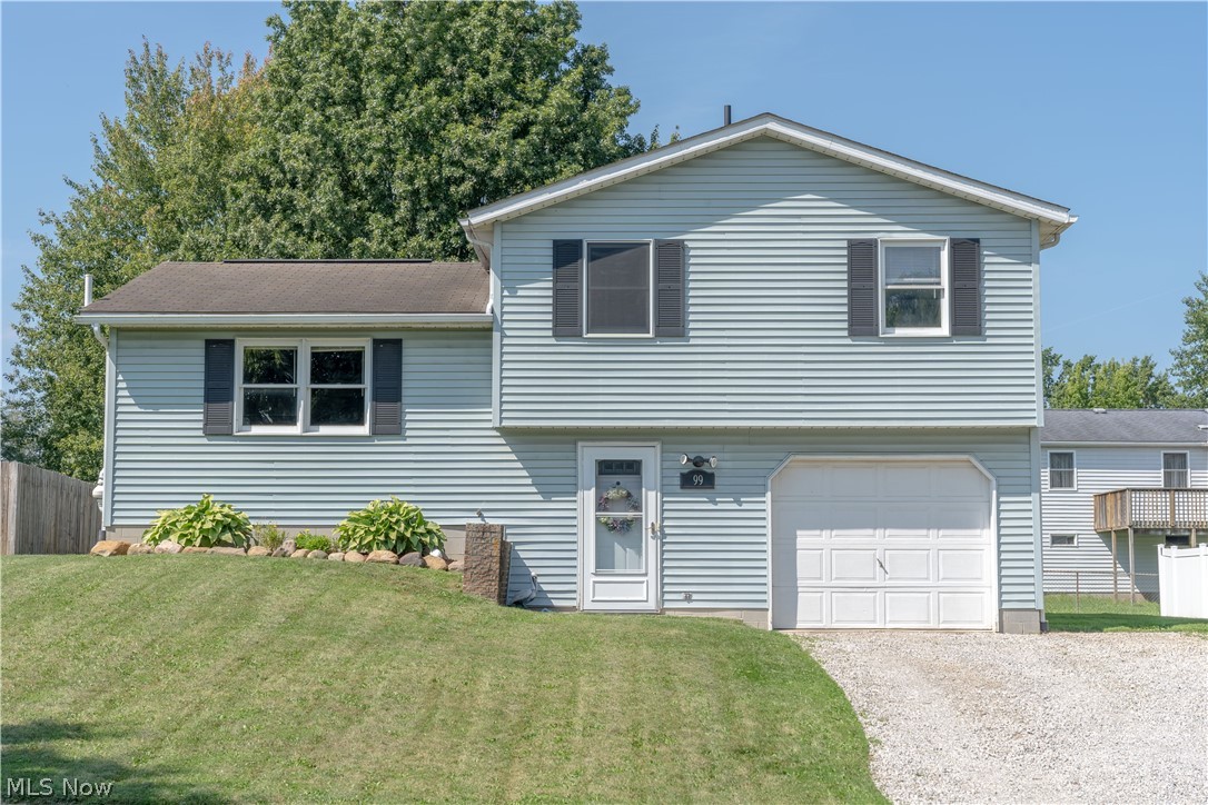 Do not miss your chance to see this WONDERFUL home just outside the city limits of Rittman. The entryway leads to a SPACIOUS powder room and access to the attached one car garage. Take a left and you will be welcomed by the main living area consisting of the LARGE living room and EAT-IN-KITCHEN. Off the kitchen you will find a sliding glass door which leads to a two tier deck which is absolutely PERFECT for entertaining. The second floor includes the three bedrooms and main full bath. The lower level is partially finished and includes a laundry area with plenty of room for a RECREATION room. The layout is HIGHLY functional and includes a good sized back yard. This home is just a stone throw away from a local neighborhood park and local amenities. Schedule your showing today!