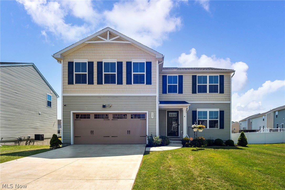 Newer built Colonial situated on a premium pond-view lot in the desirable Encore Estates at Heisley Park community within the Riverside School District! Offering over 2,220 sq ft of thoughtfully designed living space, this 4-bedroom plus a loft area, 2.5-baths, open floor plan, full basement with egress window and rough-in plumbing for a future full bath, and extensive upgrades completed during construction and afterwards.  Enjoy the fully fenced backyard featuring an 18' x 20' deck, storage shed, professional landscaping, fruit trees, flower beds, and a lawn sprinkler system with a dedicated water meter. The spacious eat-in kitchen offers granite countertops, stainless steel appliances, a center island with breakfast bar, and a dinette with access to the deck. The kitchen opens to the family room and additional flex space that can be used as a formal dining room, home office, or second living area. The primary suite features two walk-in closets and a private en-suite bath with double vanity and walk-in shower. The second floor includes conveniently located laundry room with washer and dryer.  Additional highlights are attached 2-car garage with Wi-Fi-enabled garage door opener, custom window blinds, custom primary closet organizer, built-in cubbies in the kitchen area, security and doorbell cameras, and updated chandeliers. Thousands of dollars have been invested in recent years to enhance this home, including an 18' x 20' deck (2023), chandeliers (2023), new sump pump (2025), privacy fence (2025), and professionally installed landscaping with fruit trees and flower beds (2025), plus much more. Included are kitchen appliances, washer, dryer, security and doorbell cameras, and TV mount. Conveniently located near OH-2, OH-44, parks, golf courses, shopping, restaurants, and other local attractions.