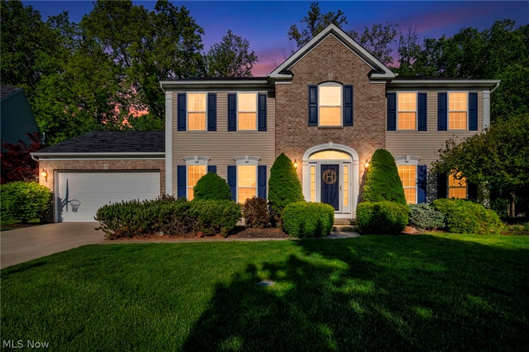 (4k video available)  Beautifully maintained & thoughtfully upgraded, this elegant & inviting home offers a light-filled interior, spacious design,  premium cul-de-sac setting in the highly desirable Amberwood subdivision of Avon w/top-rated schools. Featuring 4 spacious bedrooms, 3.5 baths, first-floor office, finished basement w/full bath, home delivers exceptional flexibility & comfort for today’s lifestyle. Attractive partial brick exterior adds timeless curb appeal, while private backyard showcases a custom raised paver-style patio surrounded by a wall of mature trees—perfect for entertaining or relaxing. Popular open floor plan is highlighted by a stunning renovated kitchen (2020) designed to impress any cook. Premium 42” raised-panel cabinetry, gorgeous quartz countertops, oversized chef’s island w/breakfast bar, pantry closet, added modern recessed lighting. Enjoy casual meals in the sought-after light-filled morning room or host gatherings in the formal dining room. Impressive floor to ceiling stone fireplace. Welcoming foyer opens to a spacious first-floor office w/French doors. Private first-floor laundry room w/utility sink adds convenience. Upgraded luxury vinyl plank flooring enhances the main living areas. Finished basement offers endless possibilities w/multiple recreation spaces, storage areas, & full bath—Endless possibilities. Comfortable owner’s suite includes a walk-in closet and private bath, creating a relaxing retreat. Pride of ownership shines throughout this exceptional property. A true must-see!